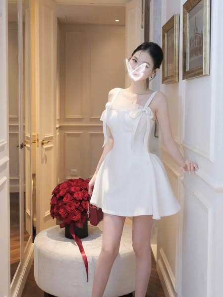 Đầm tiệc hai dây nơ bèo