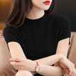 Áo len nữ tay ngắn, lông cừu dệt mịn, cổ cao vừa.