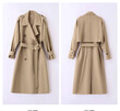 Áo khoác trench coat nữ dáng trung dài, phong cách Anh Quốc, form rộng, che khuyết điểm, thắt eo tôn dáng.