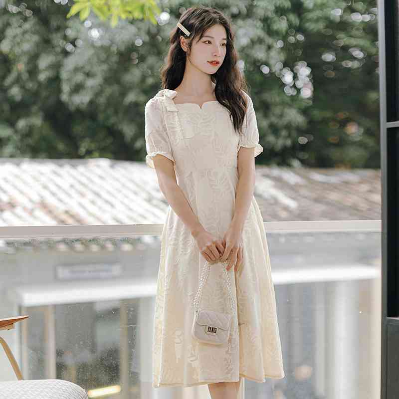 Đầm dài thắt nơ in họa tiết