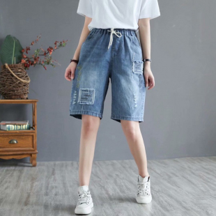 Quần short jean nữ những miếng vá