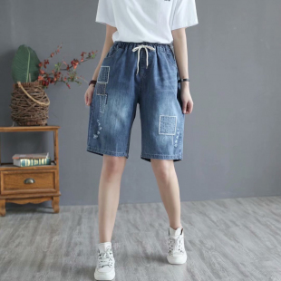Quần short jean nữ những miếng vá