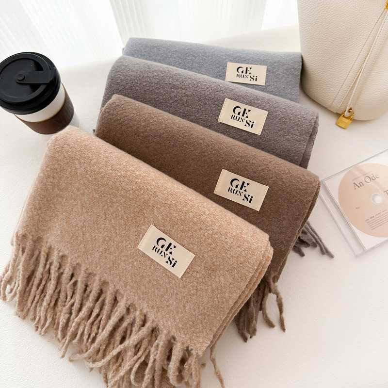 Khăn quàng cổ nữ màu trơn tua rua